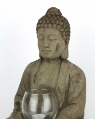 Budha sediaci sa svietnikom Rozjímanie