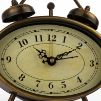 Budík ovál 12x12x4cm