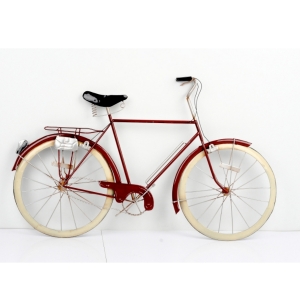 Kovová nástenná dekorácie červené koleso 89x53x5cm