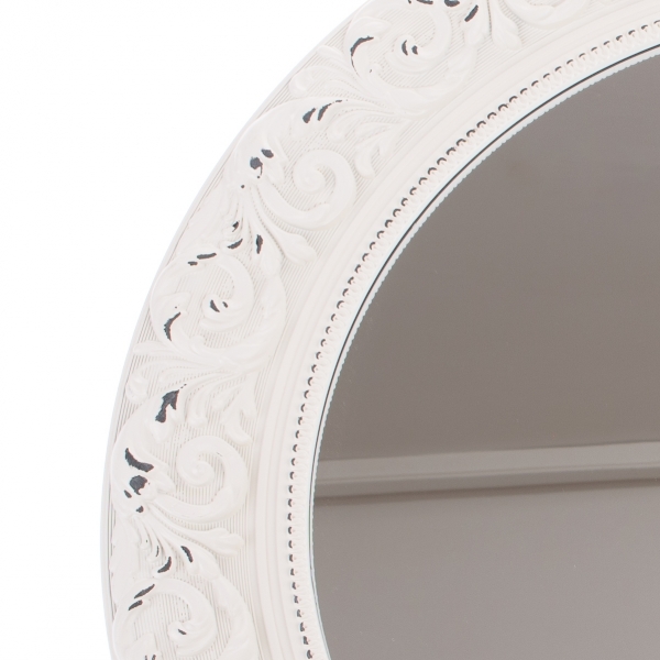 Okrúhle zrkadlo so zdobením