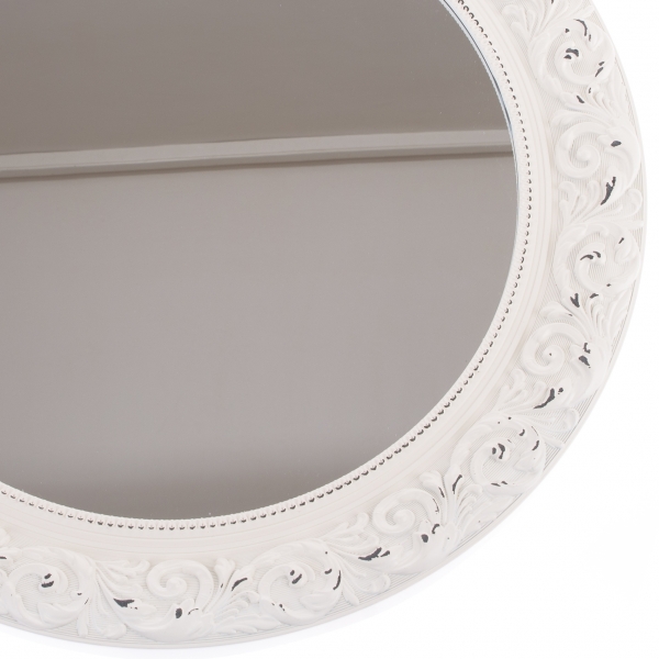 Okrúhle zrkadlo so zdobením