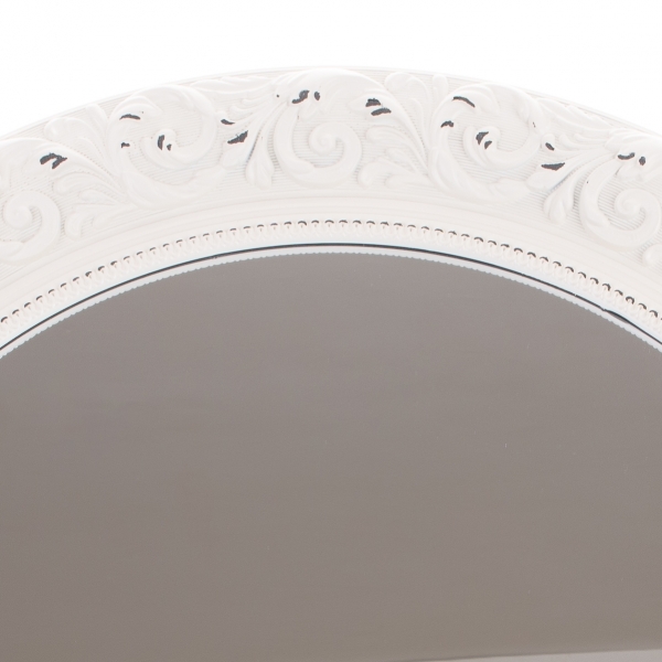 Okrúhle zrkadlo so zdobením