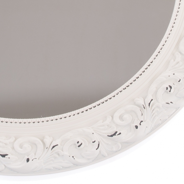 Okrúhle zrkadlo so zdobením