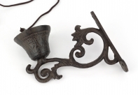 Liatinový zvonček na konzolu