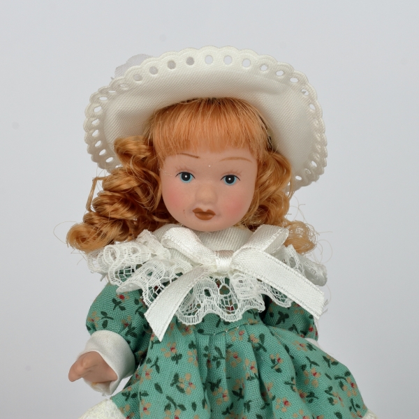 Mini bábika porcelán 12cm hrdzavé vlasy