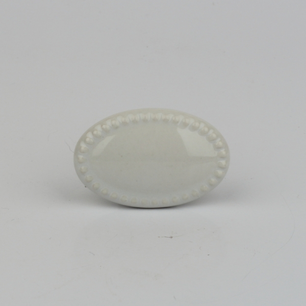 Nábytková úchytka keramická biely ovál 4x3cm