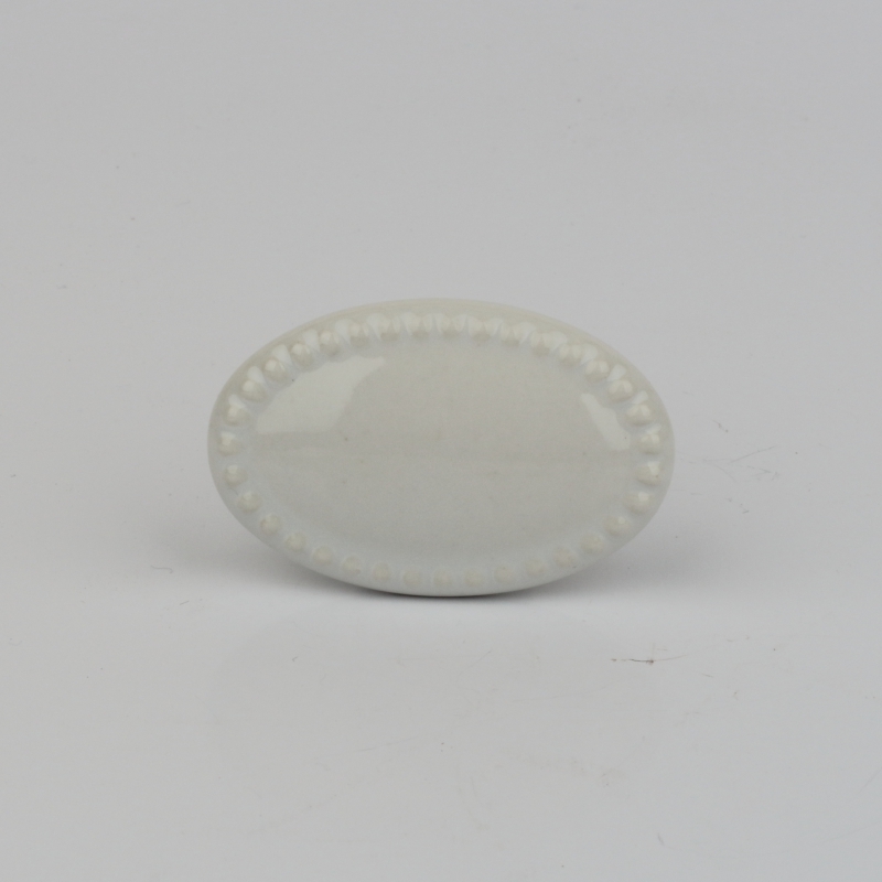 Nábytková úchytka keramická biely ovál 4x3cm