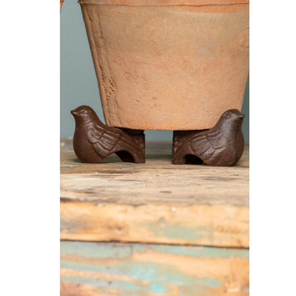 Podstavec pod kvetináč liatinový vtáčik