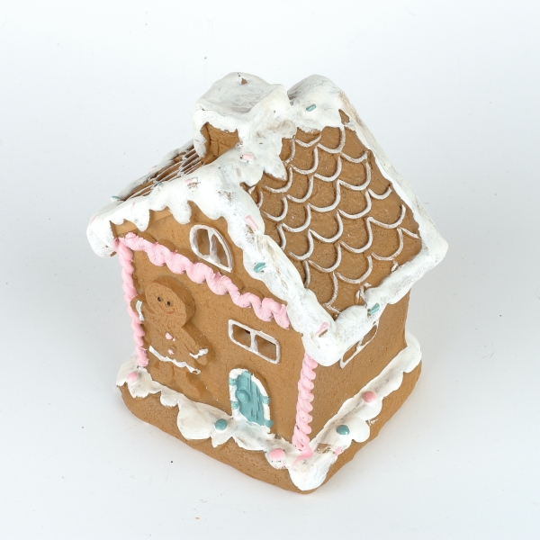 Vianočný domček s perníčkom pri vchode