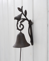 Zvonček na konzolu s vtáčikom a lístkami 22x12cm